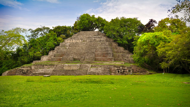 Photo of For an unusual Caribbean location, take your honeymoon in Belize. Imagine rainforests, jungle rivers, waterfalls, beautiful gardens, and island beaches with a crystal blue backdrop. Stunning beach resorts on warm turquoise waters, secluded inns in the bird-filled jungle, majestic ruins of a once-mighty empire, and polite, friendly service all contribute to a sense of comfort and ease.